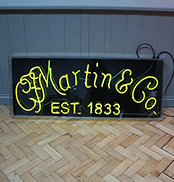 'martin & co.' neon sign